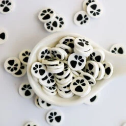 This Calls For Confetti Black And White Paw Prints Clay Embellishments